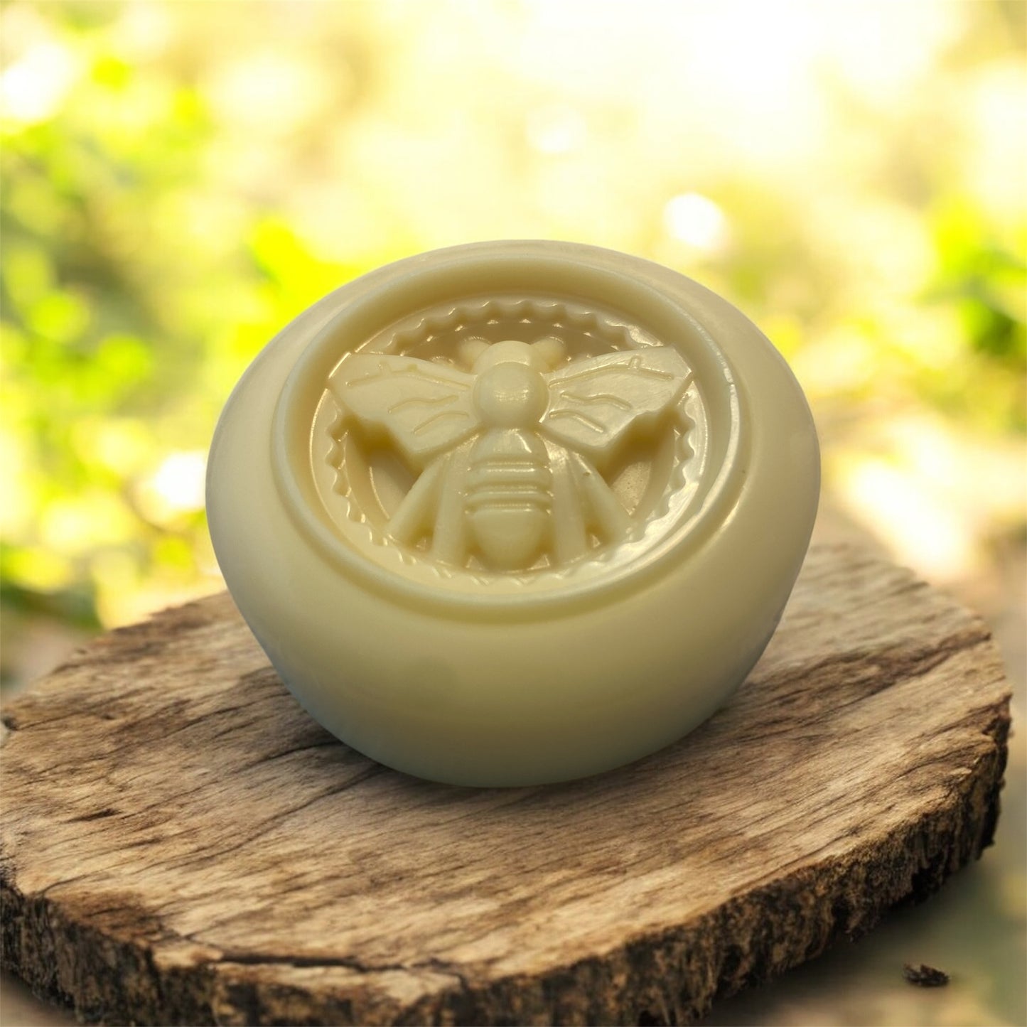 solid lotion bar on wood