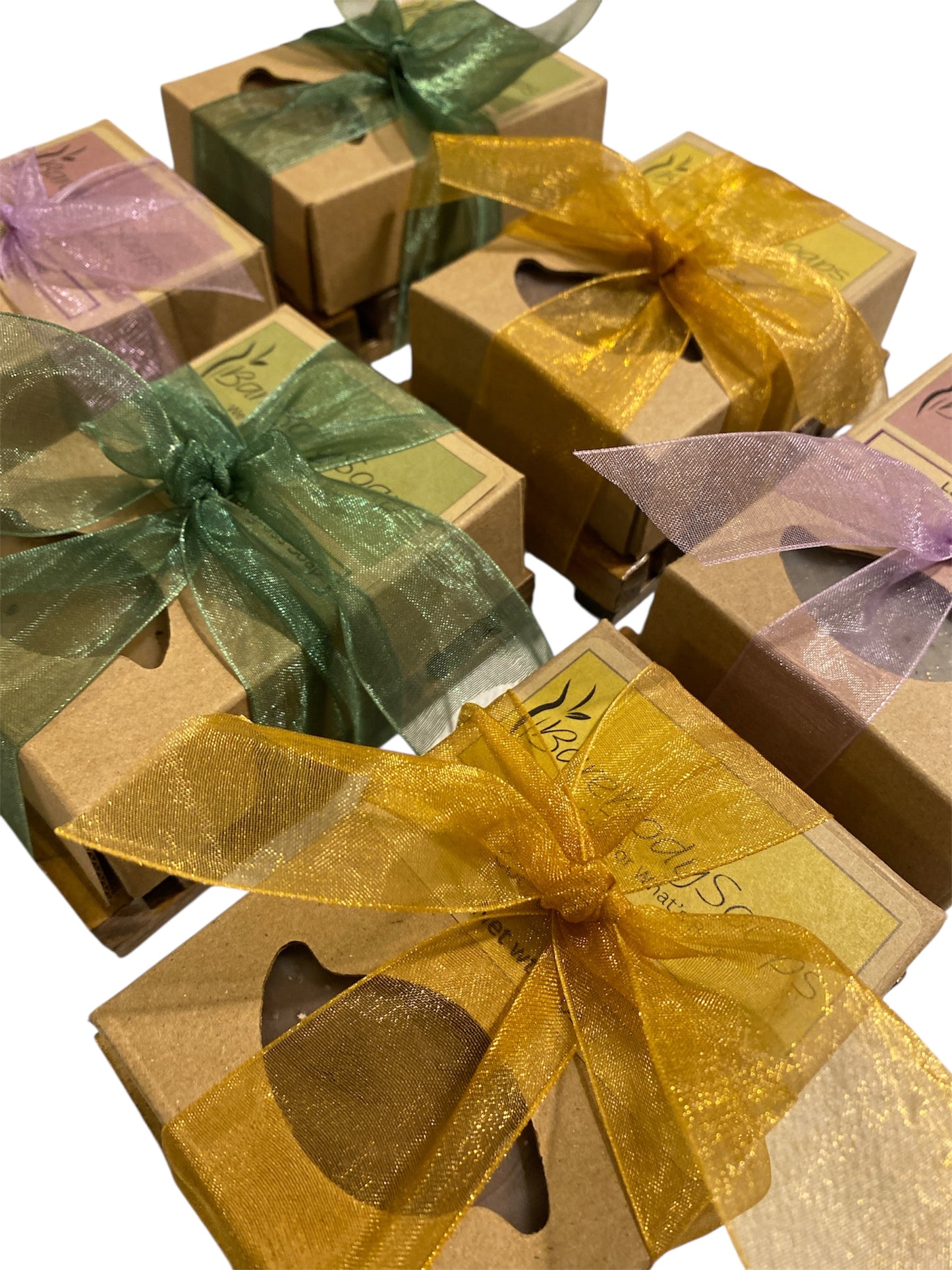 Gift boxes with colorful ribbons on a white background