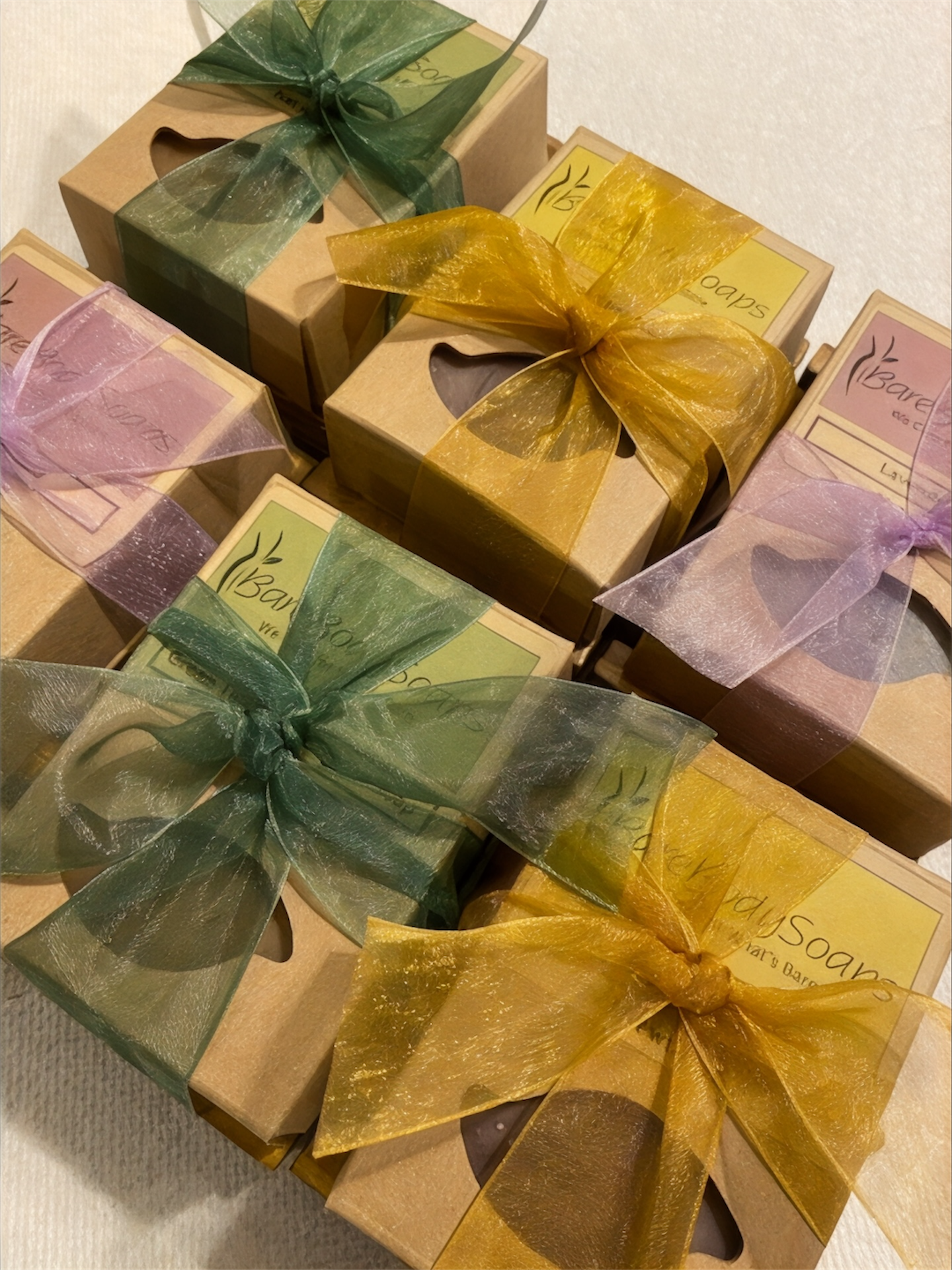 Gift boxes with colorful ribbons on a light background